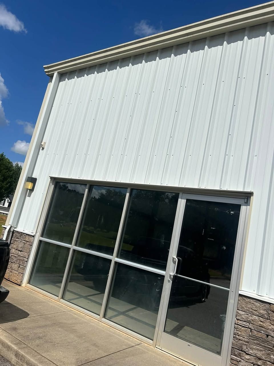 Glass storefront of the new Blue Ridge Golf Carts showroom