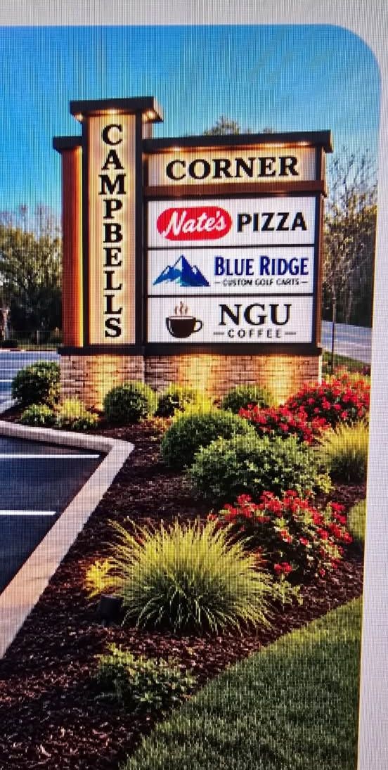 Campbell's Corner sign with Nate's Pizza, Blue Ridge Custom Golf Carts and NGU Coffee